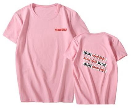 Soft pink K-pop merch T-shirt with "#LOVESTAY" text on front and "SKZ LINE DO NOT CROSS" on back, trendy and perfect for K-pop fans.