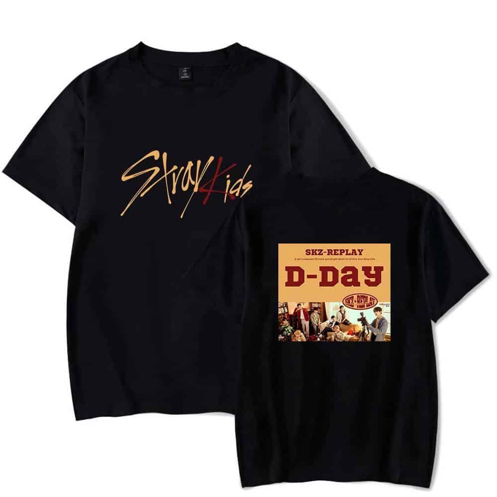 K-pop merch featuring a black t-shirt with "Stray Kids" logo and a group photo print.