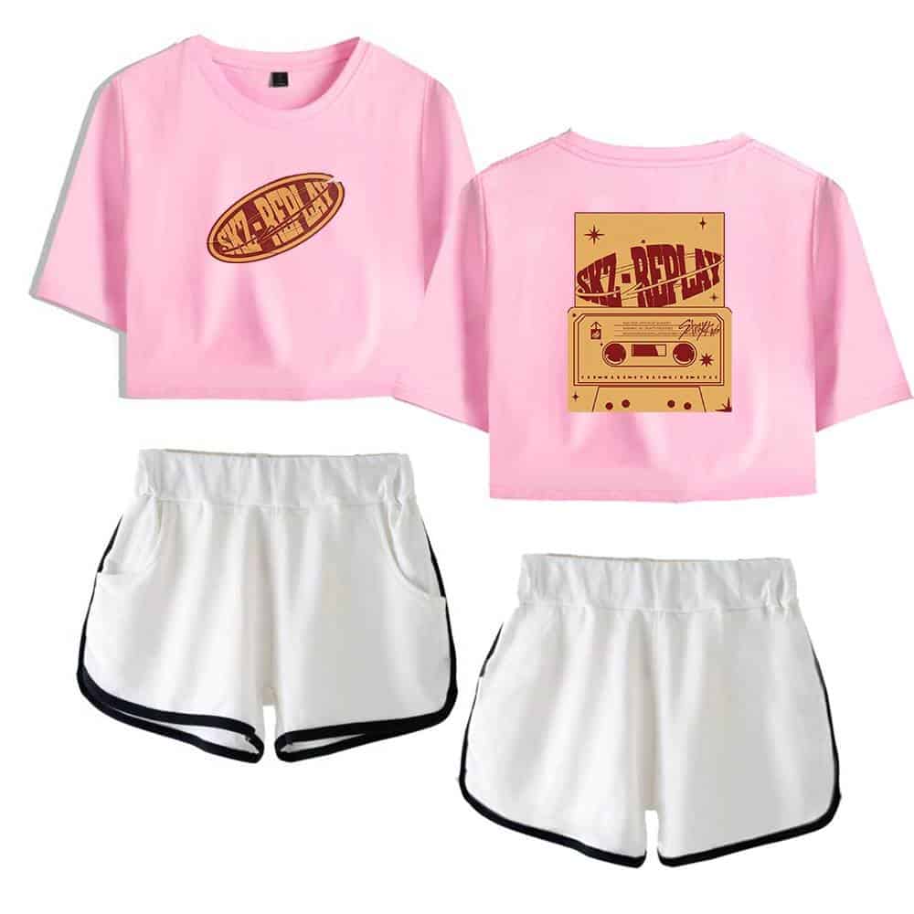 Kpop merch, pastel pink and white sportswear set with retro graphic designs, ideal for K-pop fans.